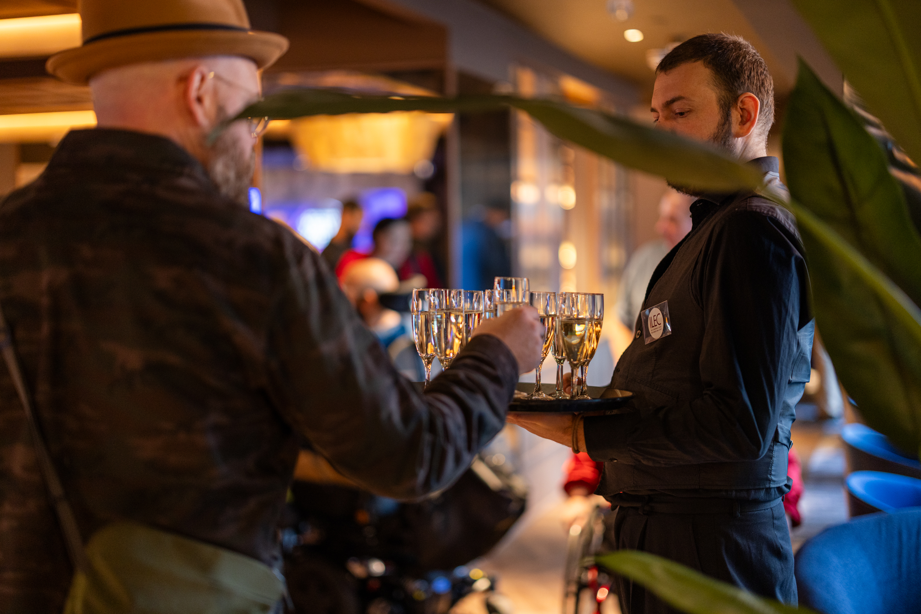 Guest taking a champagne glass